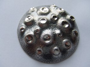 Number 3 Oxidised, polished craters